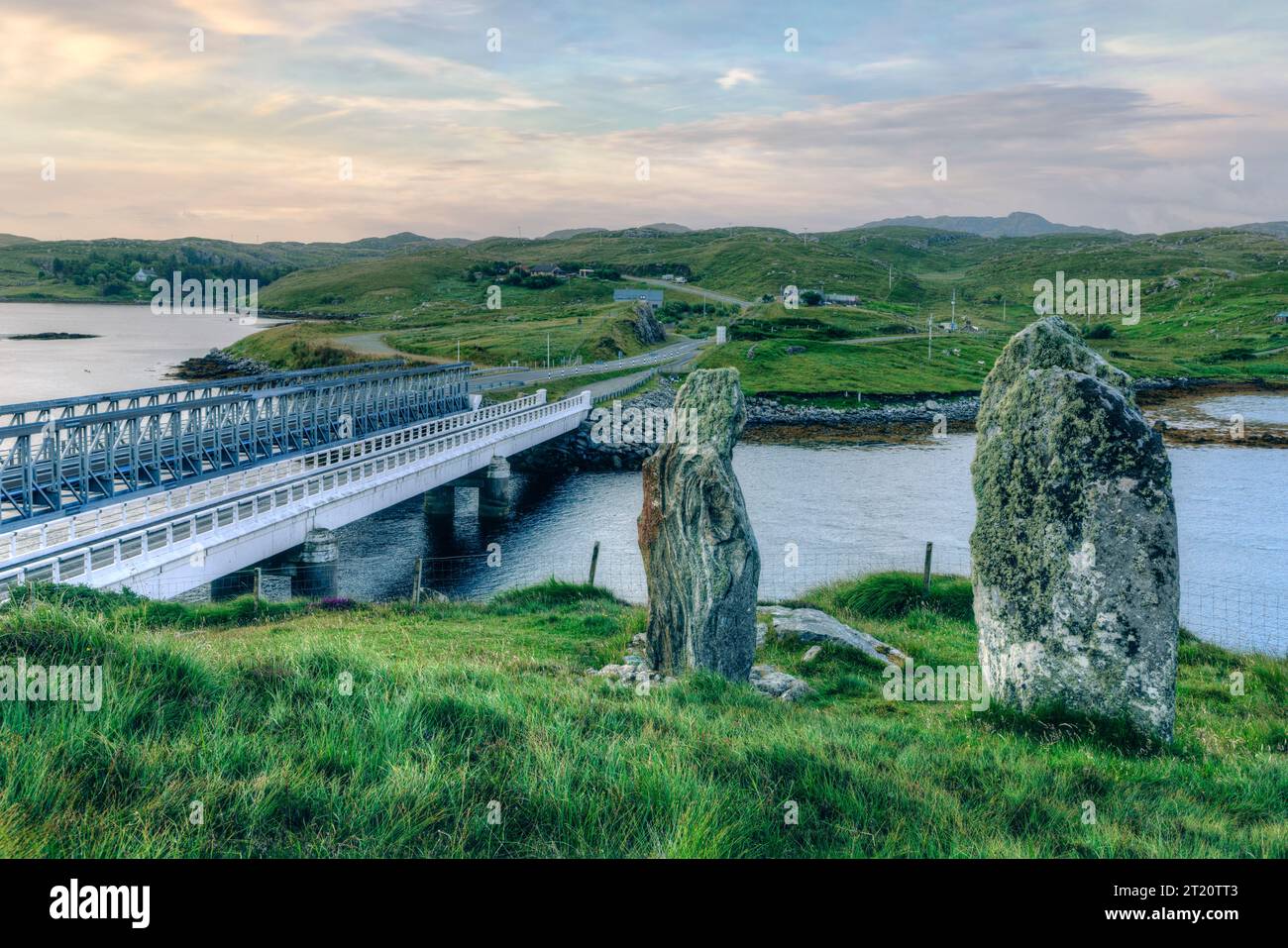 Bridge over the Atlantic to Great Bernera with standing stones, Isle of Lewis, Scotland. Stock Photo