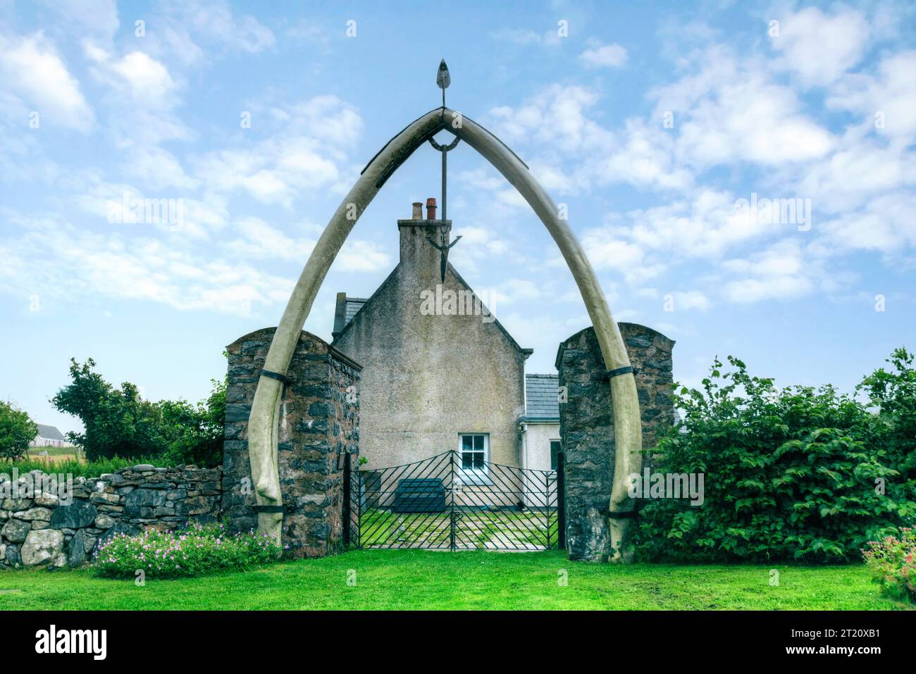 The Whalebone Arch is a natural rock archway located on the Isle of Lewis in the Outer Hebrides of Scotland. It is formed from the rib of a blue whale Stock Photo