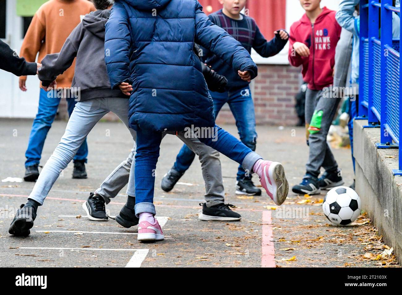 Children playing in an elementary school playground stock photo alamy