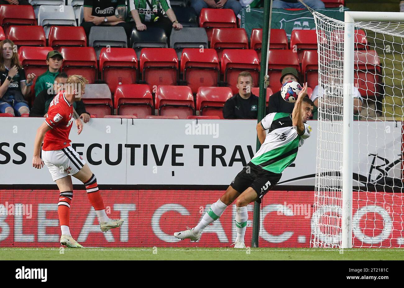 Jayden Stockley of Charlton Athletic  has a shot on goal handled by James Wilson of Plymouth Argyle and is shown a red card. - Charlton Athletic v Plymouth Argyle, Sky Bet League One, The Valley, Charlton, UK - 16th August 2022 Editorial Use Only - DataCo restrictions apply Stock Photo