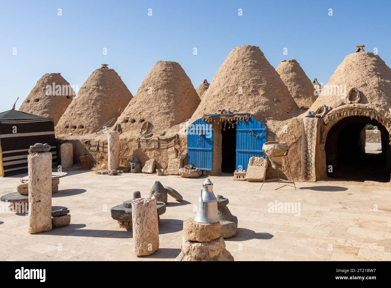 A beehive or tomb house is a building made from a circle of stones and mud topped with a domed roof. The name comes from the similarity in shape to a Stock Photo