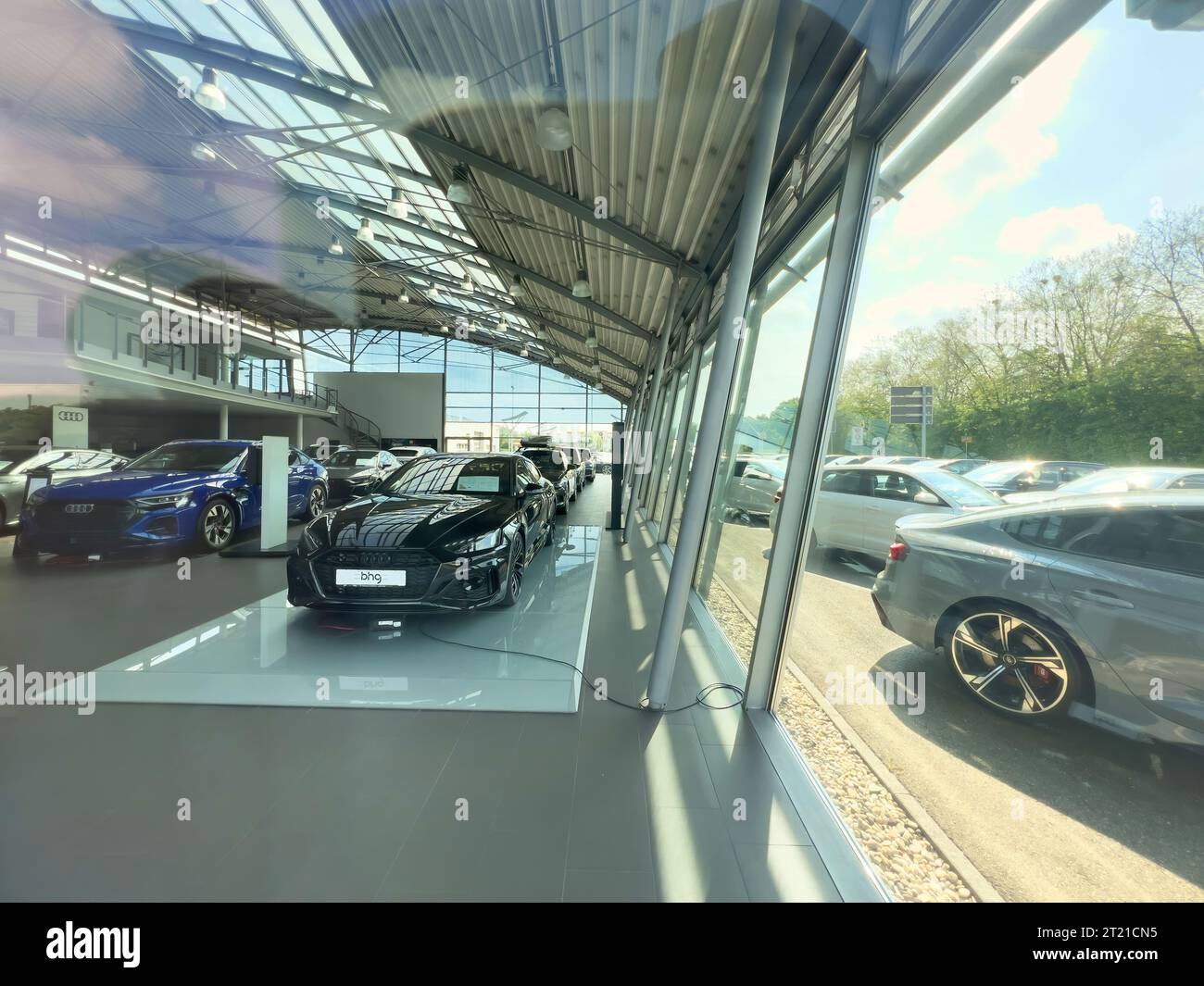 Germany May 1, 2023 Interior of an Audi German car dealership view from the street with