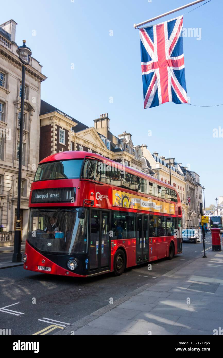 Typical double decker bus in a street of London Stock Photo