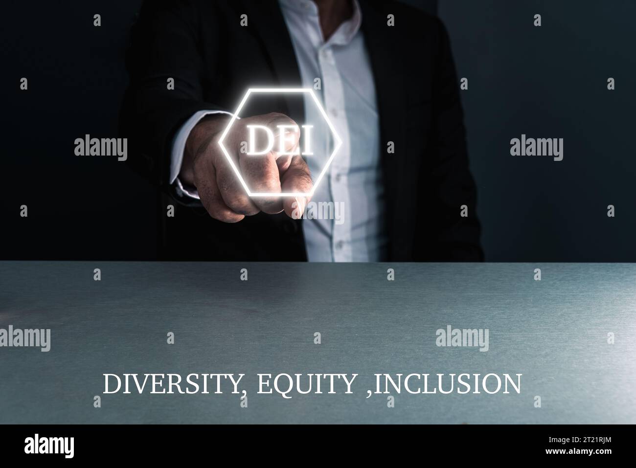 Man in suit using virtual touchscreen with the letters D ,E ,I , diversity equity Inclusion , concept , copy space . Stock Photo