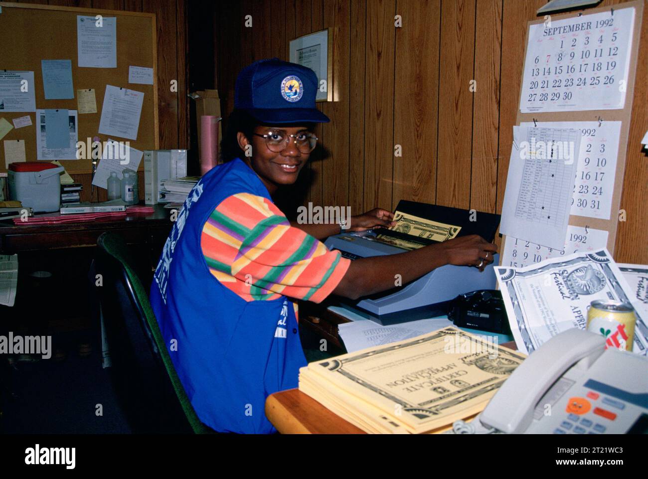 Fish and Wildlife Service volunteer with logo at desk in office, typing certificates of appreciation. Subjects: Employees (USFWS); Volunteers; Wildlife refuges. Location: Washington. Fish and Wildlife Service Site: LEAVENWORTH NATIONAL FISH HATCHERY.   Collection: Wildlife Refuges.. 1998 - 2011. Stock Photo