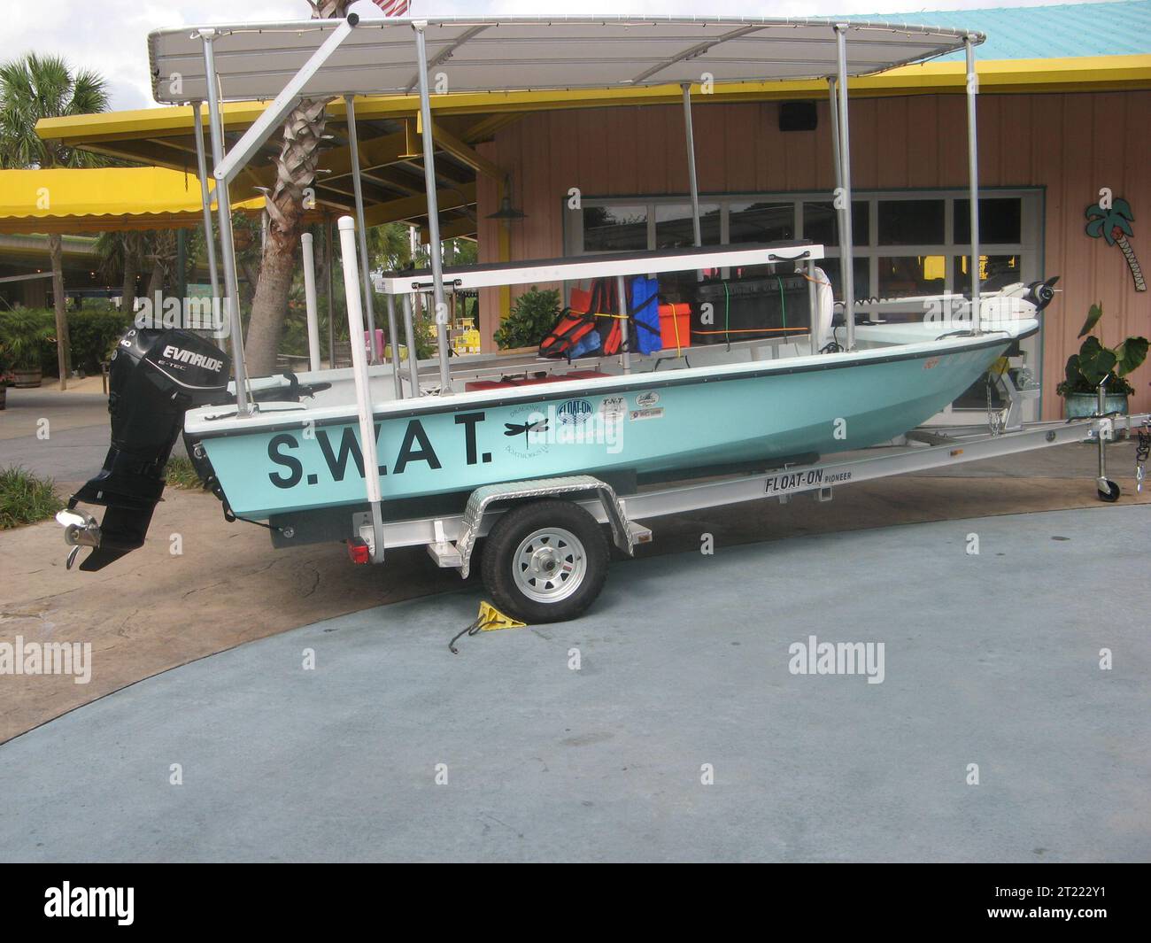 Gulf Shores, Ala - July 19, 2010: The Shallow Water Attention Terminal (SWAT) boat donated to the Friends of Bon Secour National Wildlife Refuge by Jimmy Buffett. Lulu's, a restaurant owned by Buffett's sister, hosted the event. The boat's color, depth, m. Subjects: Boats; Deepwater Horizon Oil Spill. Location: Alabama. Fish and Wildlife Service Site: BON SECOUR NATIONAL WILDLIFE REFUGE. Stock Photo