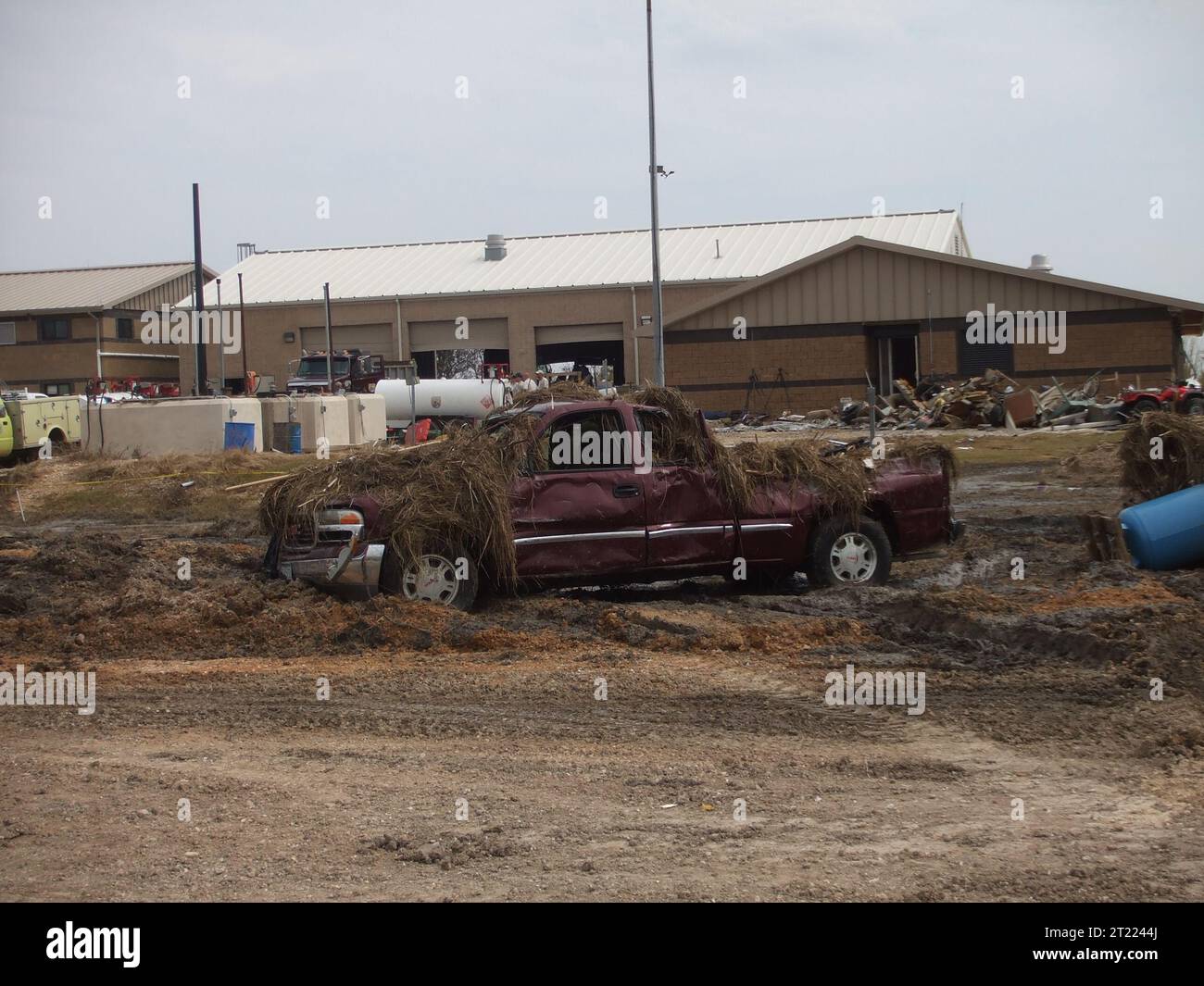 This truck and building sustained damage from the force of hurricane Ike. Subjects: Aquatic environments; Automobiles; Buildings, facilities and structures; Climate effects; Coastal environments; Contaminants; Ecosystem recovery; Environmental quality; Environments (Natural); Equipment; Pollution; Pollution cleanup; Pollution control; Re. Location: Texas. Fish and Wildlife Service Site: ANAHUAC NATIONAL WILDLIFE REFUGE. Stock Photo