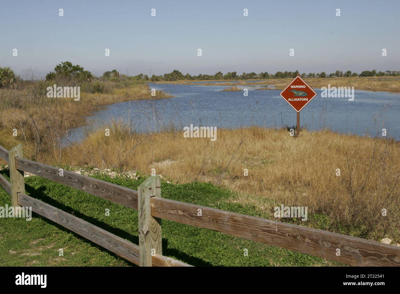Predators Cation Sign A warning sign at St. Marks National Wildlife Refuge reminds visitors ...