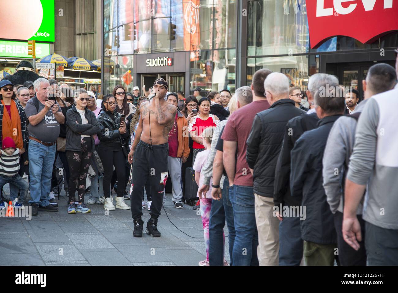 Street acrobats and entertainers draw in large crowds regularly in the