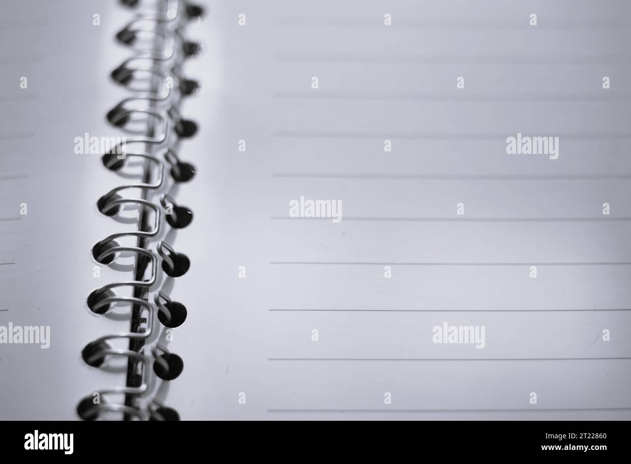 blank white papers in a line, open notepad on a spiral. Stock Photo
