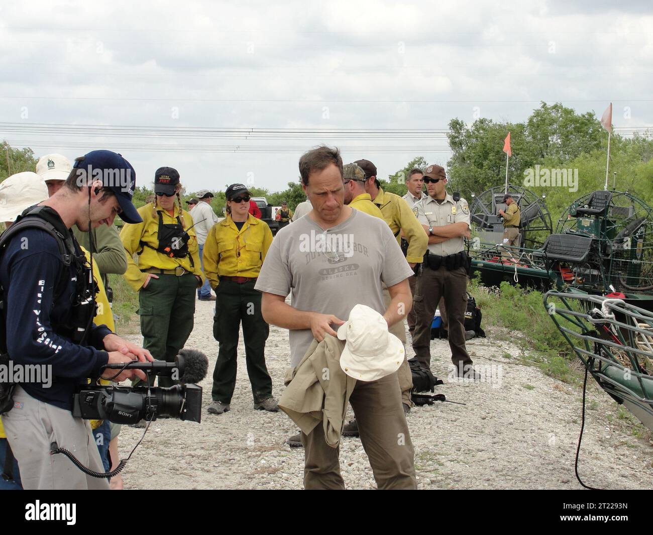 Mike Rowe, the popular host of the Discovery Channel series 'Dirty Jobs with Mike Rowe,' brings his show to the U.S. Fish and Wildlife Service's Arthur R. Marshall Loxahatchee National Wildlife Refuge in April 2010. Between segments, Mike returned to a g. Subjects: Connecting people with nature; Work of the Service. Location: Florida. Fish and Wildlife Service Site: ARTHUR R. MARSHALL LOXAHATCHEE NATIONAL WILDLIFE REFUGE. Stock Photo