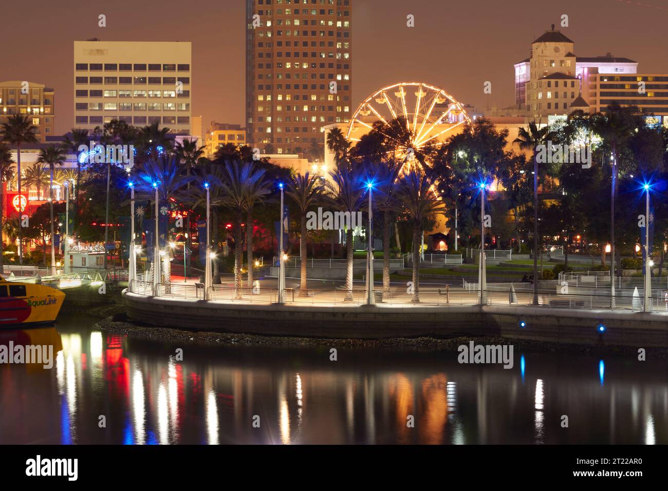 Night View Of The Pike And Downtown Long Beach Seen From Rainbow Harbor, California, USA. Stock Photo
