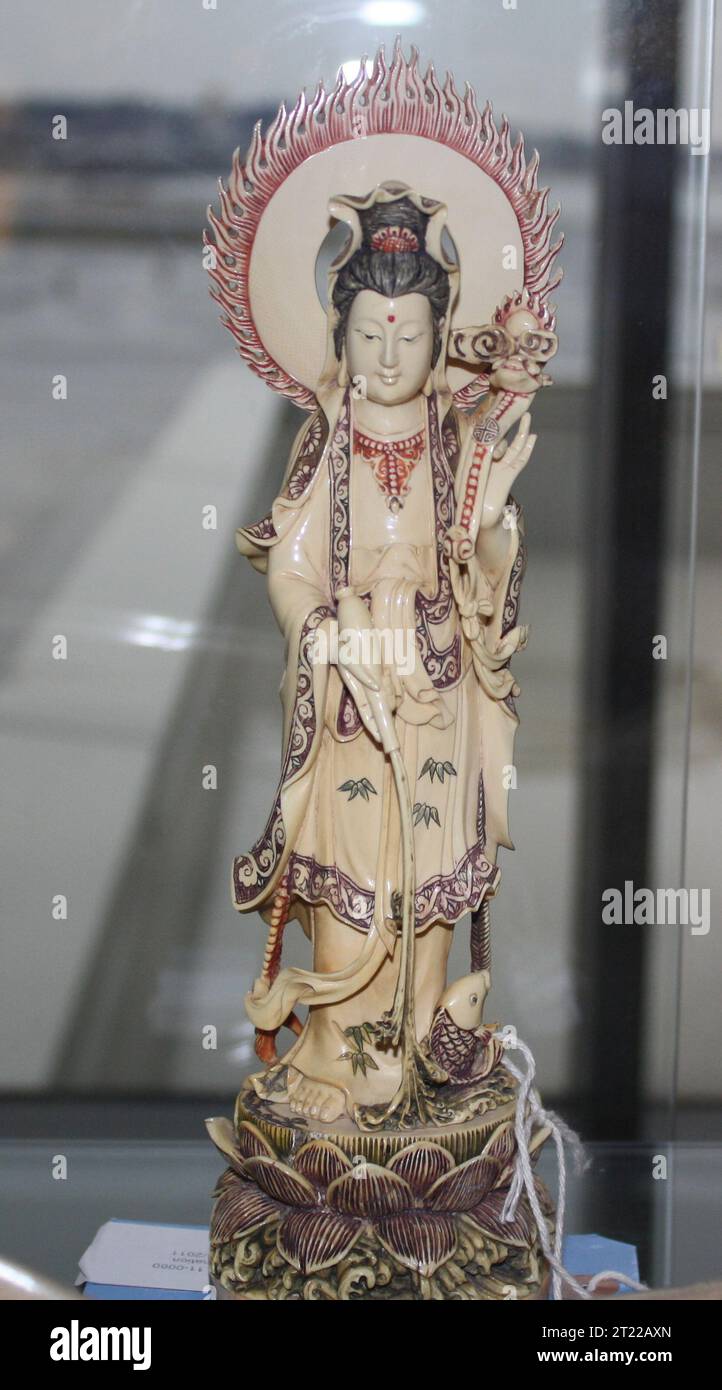 Statue made out of elephant ivory on display as part of the Service's 'Buyer Beware' exhibit located in Logan airport, Boston, MA. The exhibit is designed to educate travelers about the hazards of purchasing wildlife products abroad that are made from en. Subjects: Art; Exhibits; Law enforcement. Location: Massachusetts.  . 1998 - 2011. Stock Photo