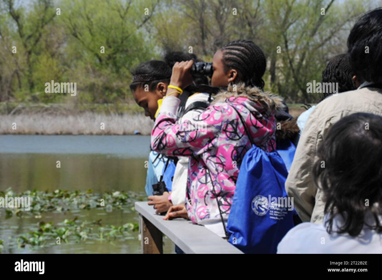 Children search for birds in the John Heinz National Wildlife Refuge. Subjects: Birdwatching; Birds; Children; Education; Education outreach; Events; Recreation; Work of the Service. Location: Pennsylvania. Fish and Wildlife Service Site: JOHN HEINZ NATIONAL WILDLIFE REFUGE AT TINICUM. Stock Photo
