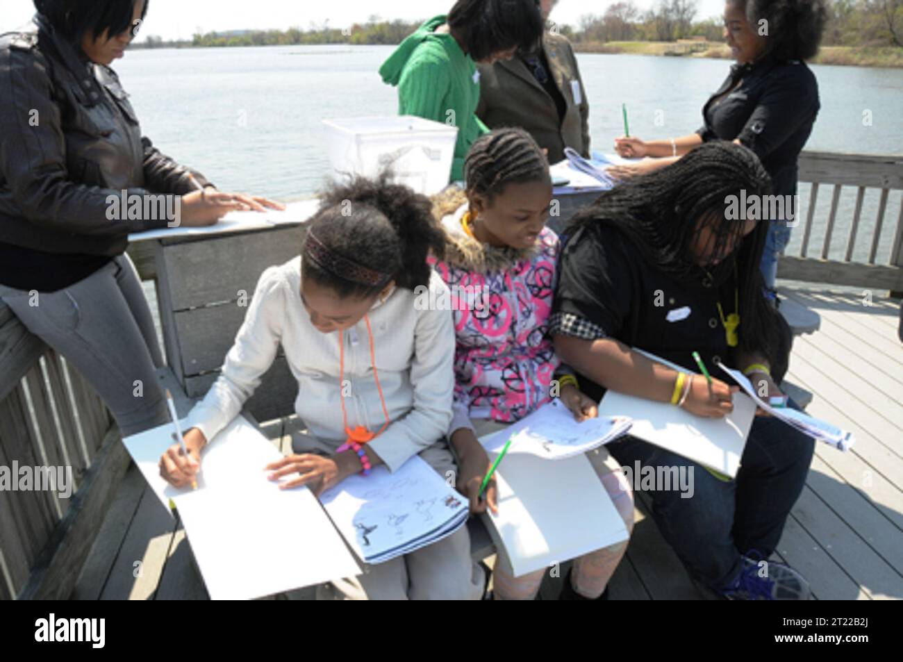 Children try drawing different types of waterfowl at the John Heinz National Wildlife Refuge at Tinicum. Subjects: Birdwatching; Birds; Children; Education; Education outreach; Events; Recreation; Work of the Service. Location: Pennsylvania. Fish and Wildlife Service Site: JOHN HEINZ NATIONAL WILDLIFE REFUGE AT TINICUM. Stock Photo
