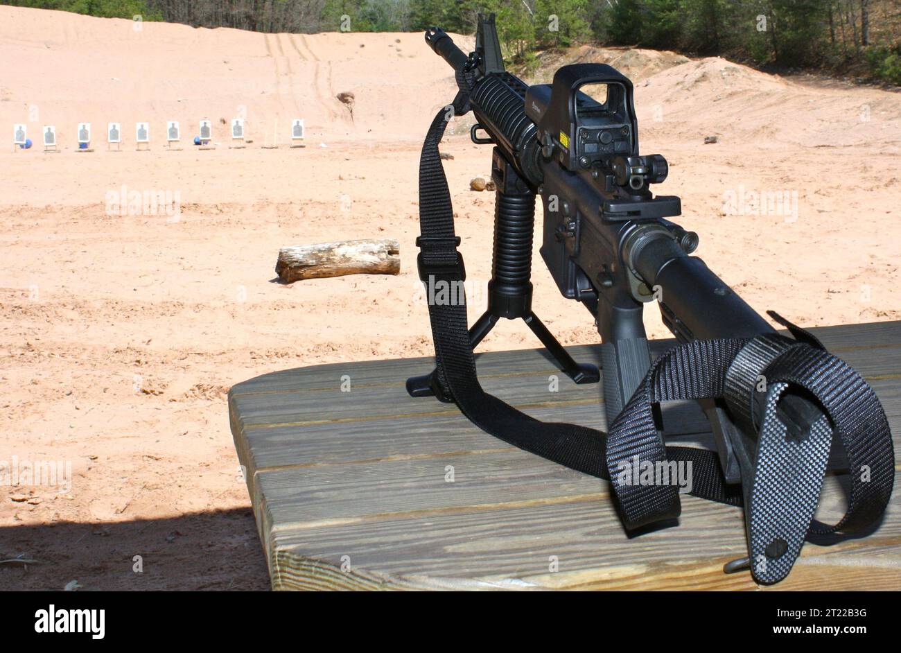 An AR-15 rifle sits on a stand at a firing range in Connecticut, part ...