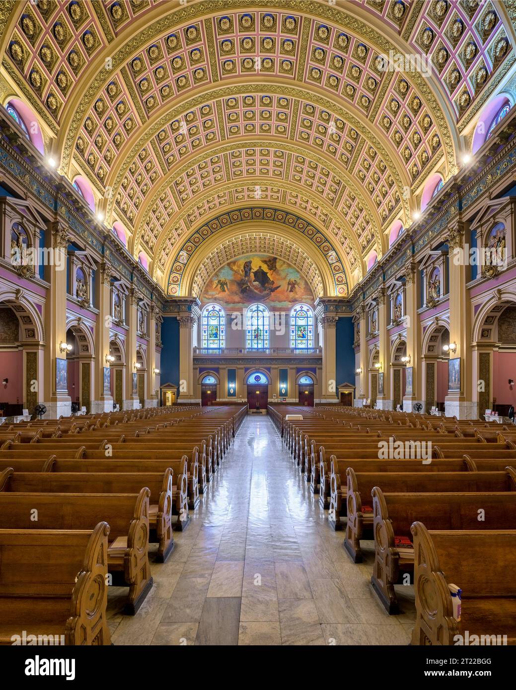 Rear entrance and stained glass windows inside Our Lady of Sorrows