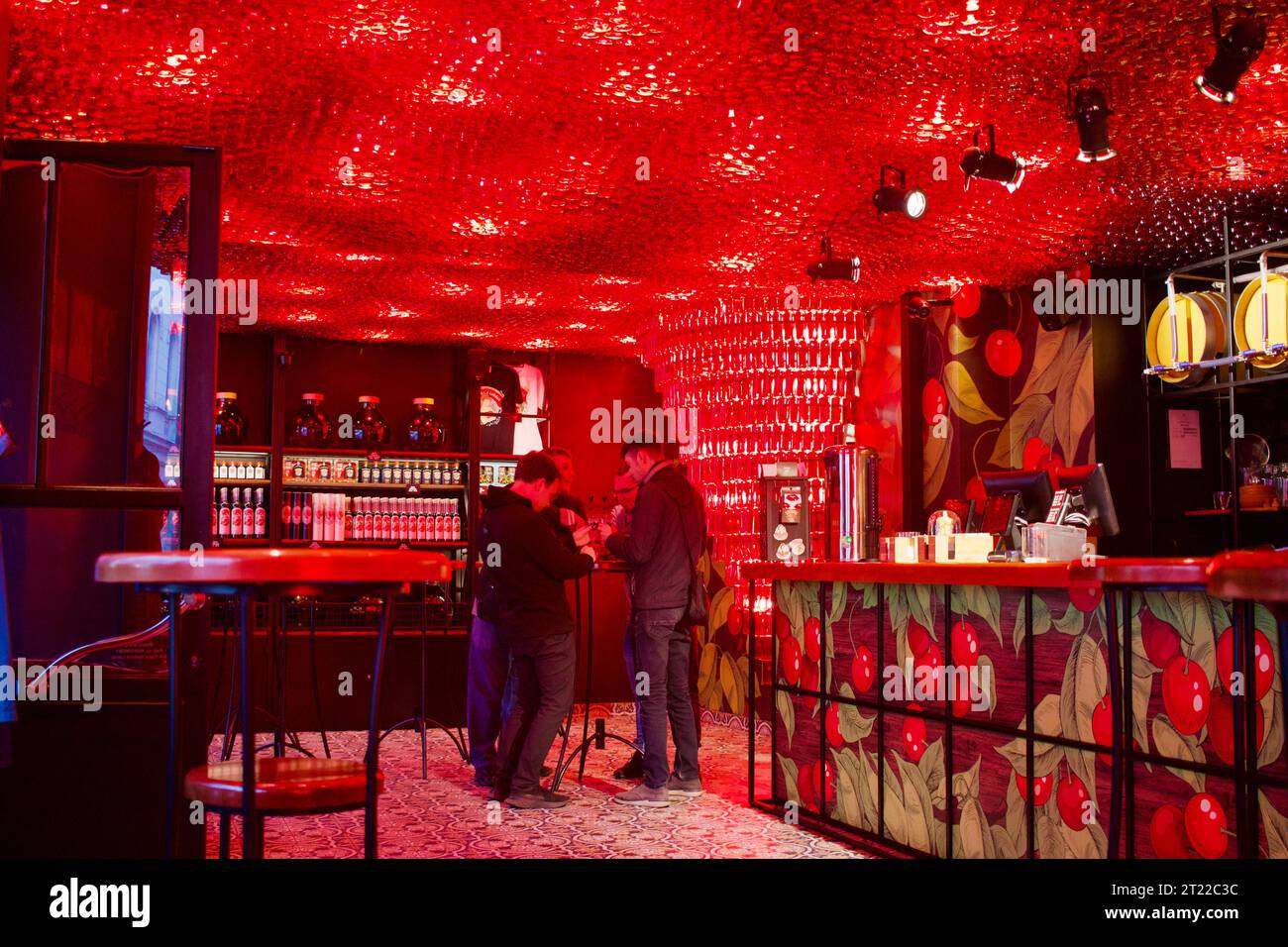 The wonderful bright red décor of the Piana Vyshnia bar in Riga, Latvia selling only their famous cherry liqueur, hot or cold Stock Photo