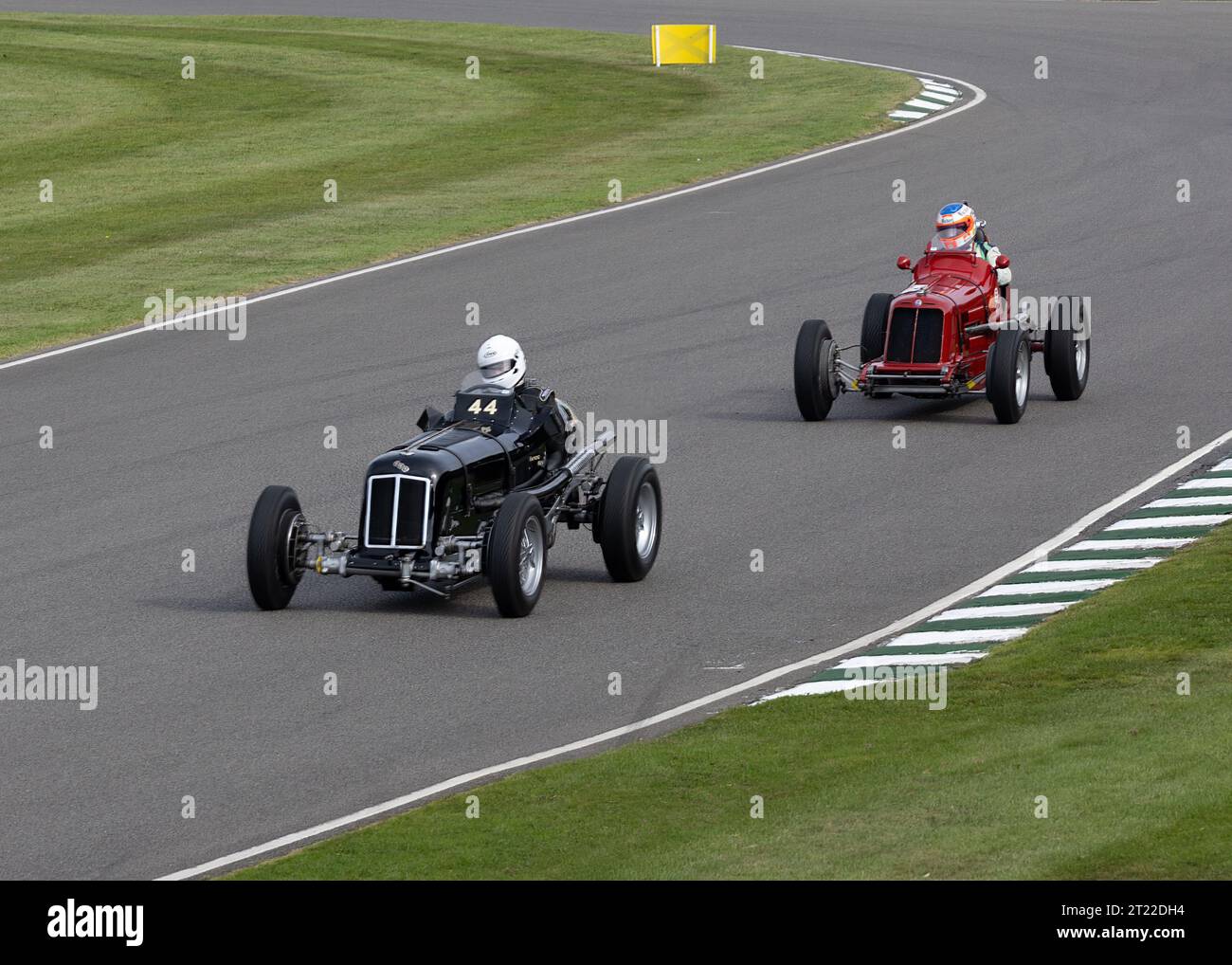 Ben Fidler's 1938 ERA Type-24 racing car leads another ERA at the 2033 Goodwood Revival Stock Photo