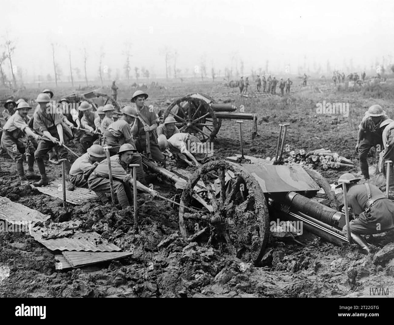 The Third Battle of Ypres (The Battle of Passchendaele). Royal Field Artillery gunners hauling an 18 pounder field gun out of the mud near Zillebeke, 9 August 1917. Photo by John Warwick Brooke. Stock Photo