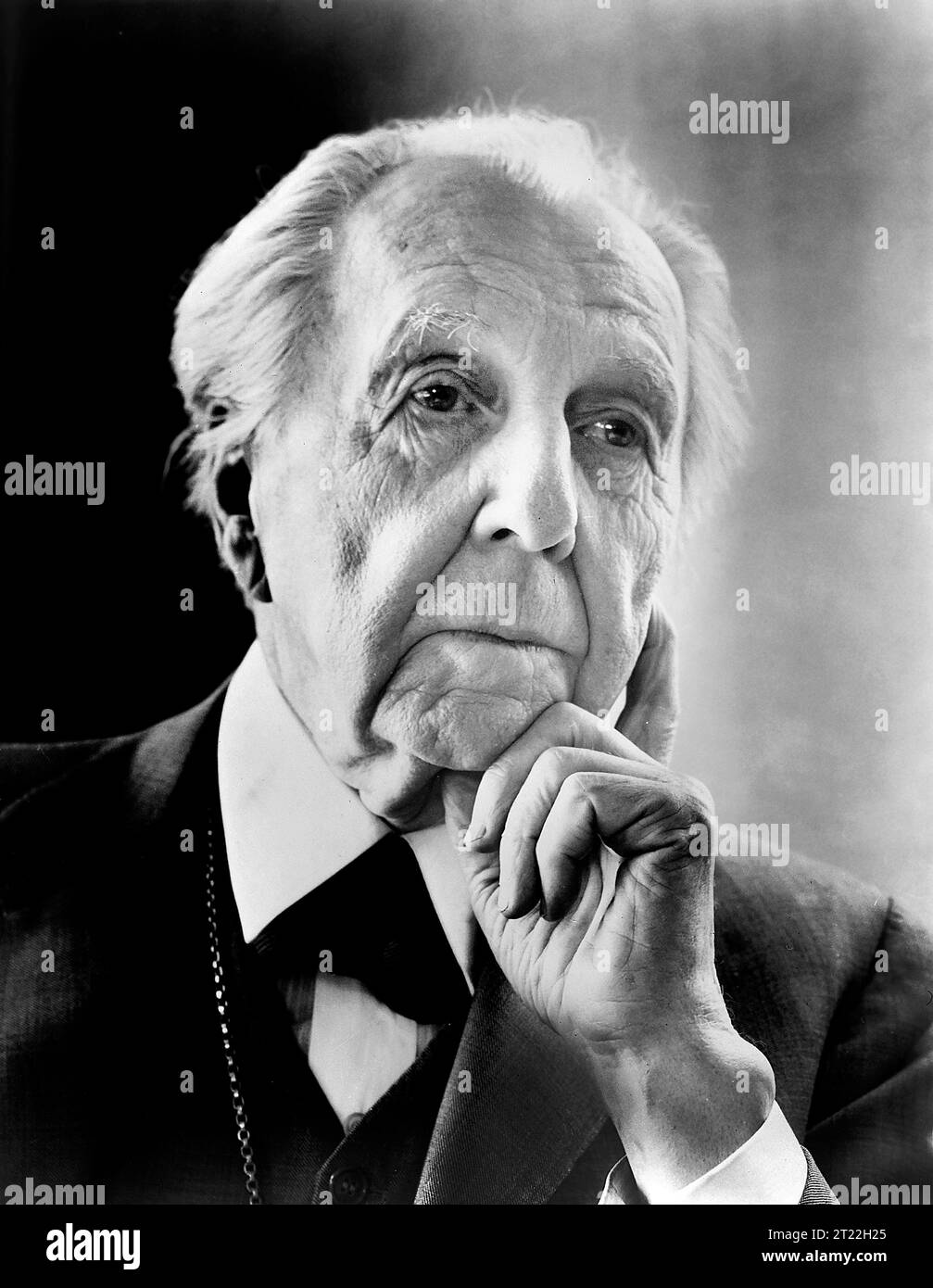 Frank Lloyd Wright (1867-1959), American architect, designer, writer, and educator, head and shoulders portrait looking left, Al Ravenna, New York World-Telegram and the Sun Newspaper Photograph Collection, 1954 Stock Photo