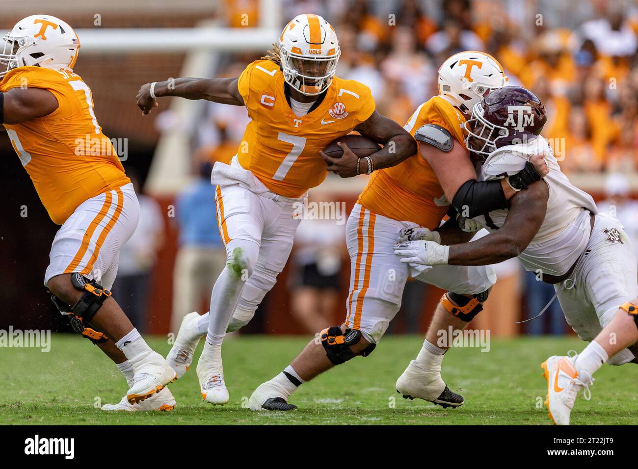 Tennessee quarterback Joe Milton III (7) runs for yardage during the