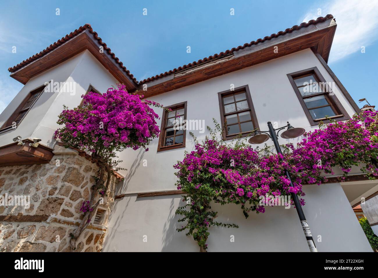 Old Houses with bougainvilleas in Kaleici old town of Antalya Stock Photo