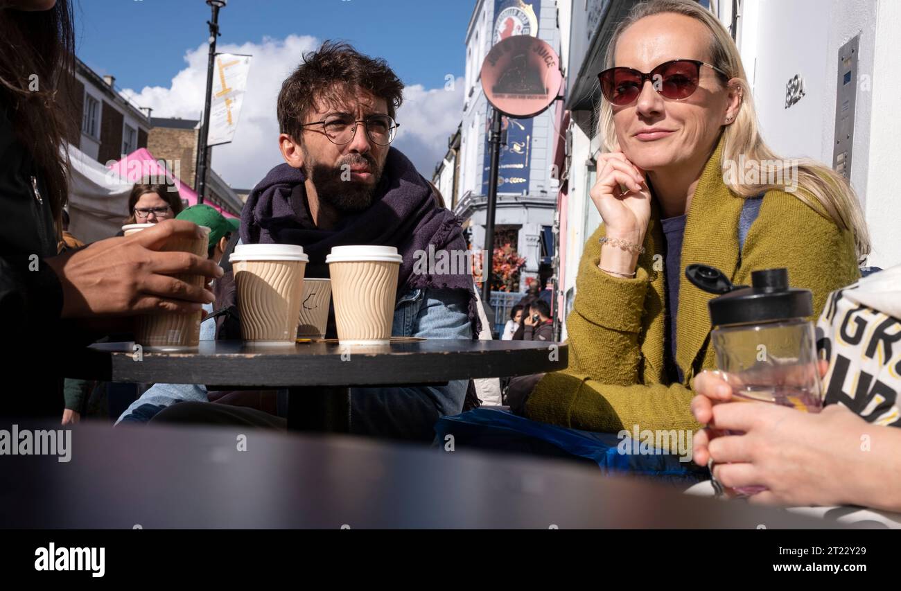 Portobello Road, people sitting at hip cafe, Notting Hill district, West London, England, United Kingdom Stock Photo