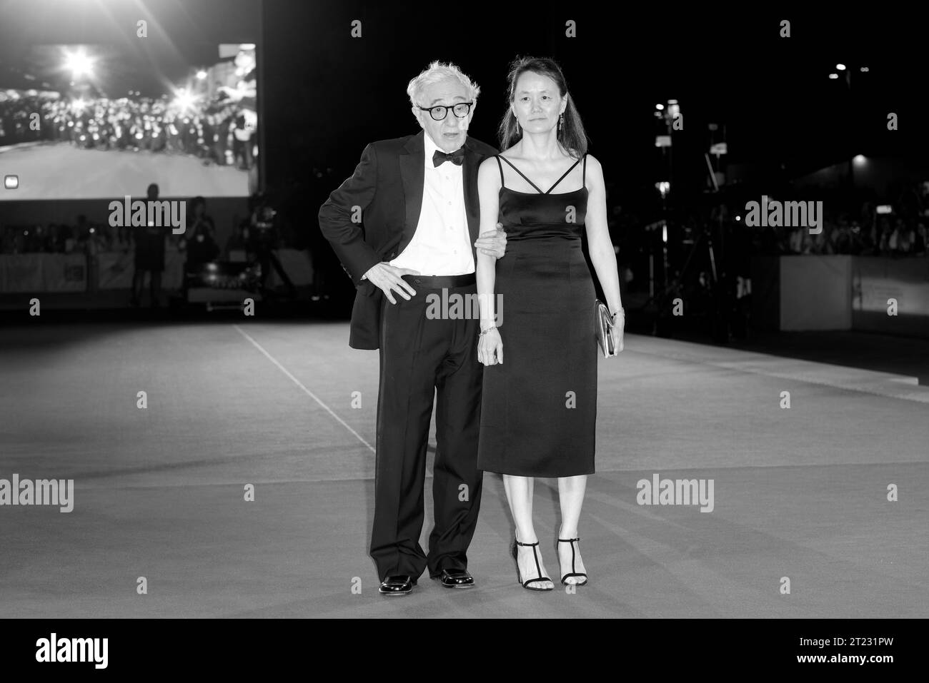 VENICE, ITALY - SEPTEMBER 04: Director Woody Allen and Soon-Yi Previn attend the red carpet for the movie 'Coup De Chance' at the 80th Venice Internat Stock Photo