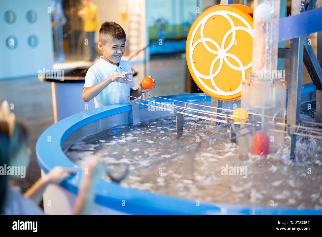 Little boy playing in a science museum Stock Photo