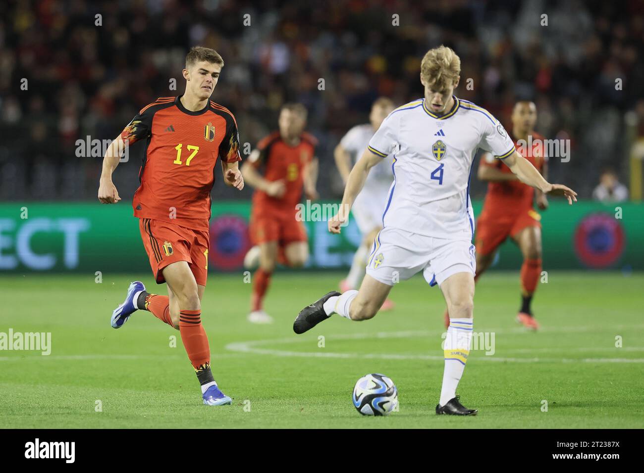 Brussels, Belgium. 16th Oct, 2023. Belgium's Charles De Ketelaere and Sweden's Filip Helander fight for the ball during a soccer game between Belgian national soccer team Red Devils and Sweden, Sunday 15 October 2023 in Brussels, match 7/8 in Group F of the Euro 2024 qualifications. BELGA PHOTO BRUNO FAHY Credit: Belga News Agency/Alamy Live News Stock Photo