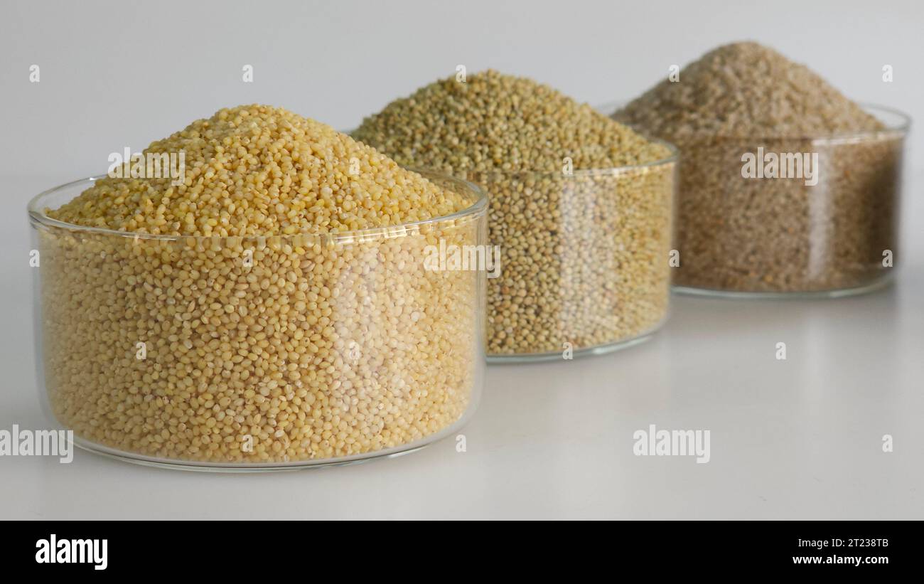 3 millets in glass bowls filled to the brim arranged in a raw. They are