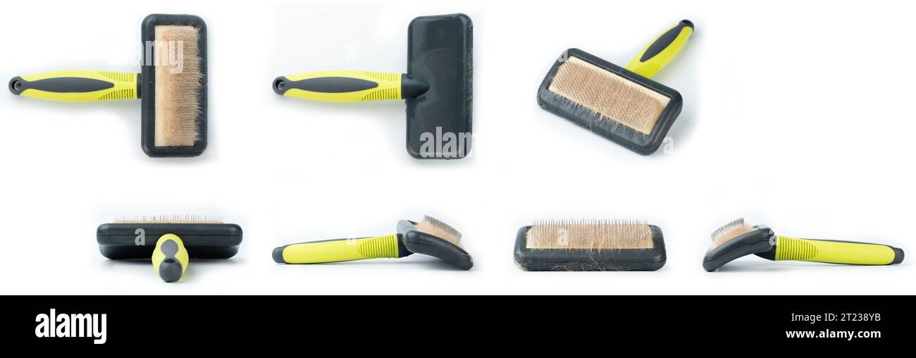 Different views of animal brush comb with  brown hair isolated on white studio background Stock Photo