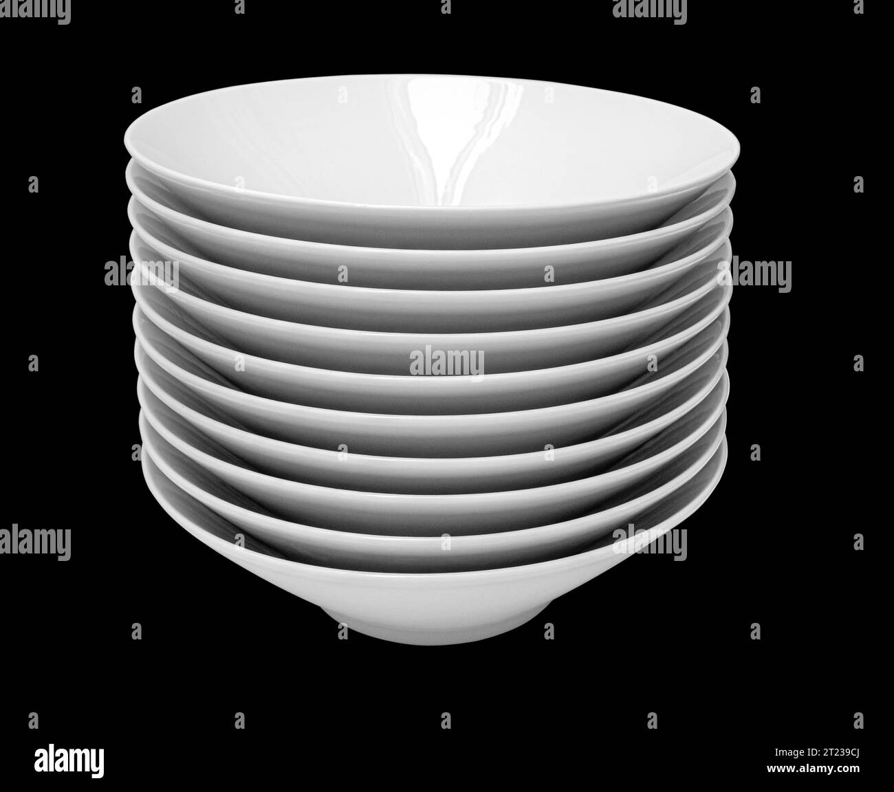 A stack of square white plates isolated on black background Stock Photo ...