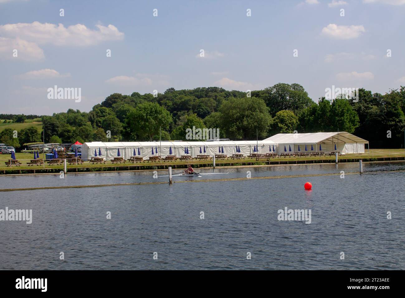 14 June 23 Marquees and tents on the bank of the Thames at Henley-on-Thames in Oxfordshire, in preparation for the Royal Regatta, on a fine summer aft Stock Photo