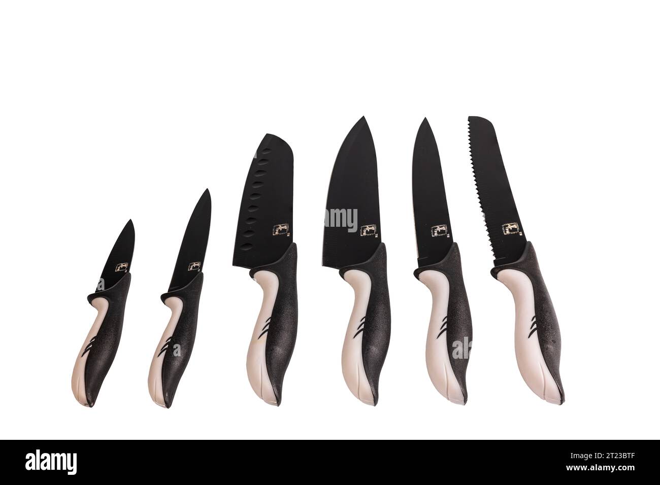 Close up view of set of kitchen knives isolated on white background