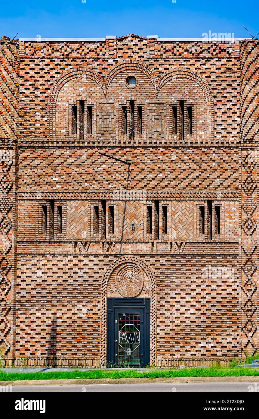 A historic building featuring decorative brickwork is pictured on Main Street, June 24, 2023, in Moss Point, Mississippi. Stock Photo