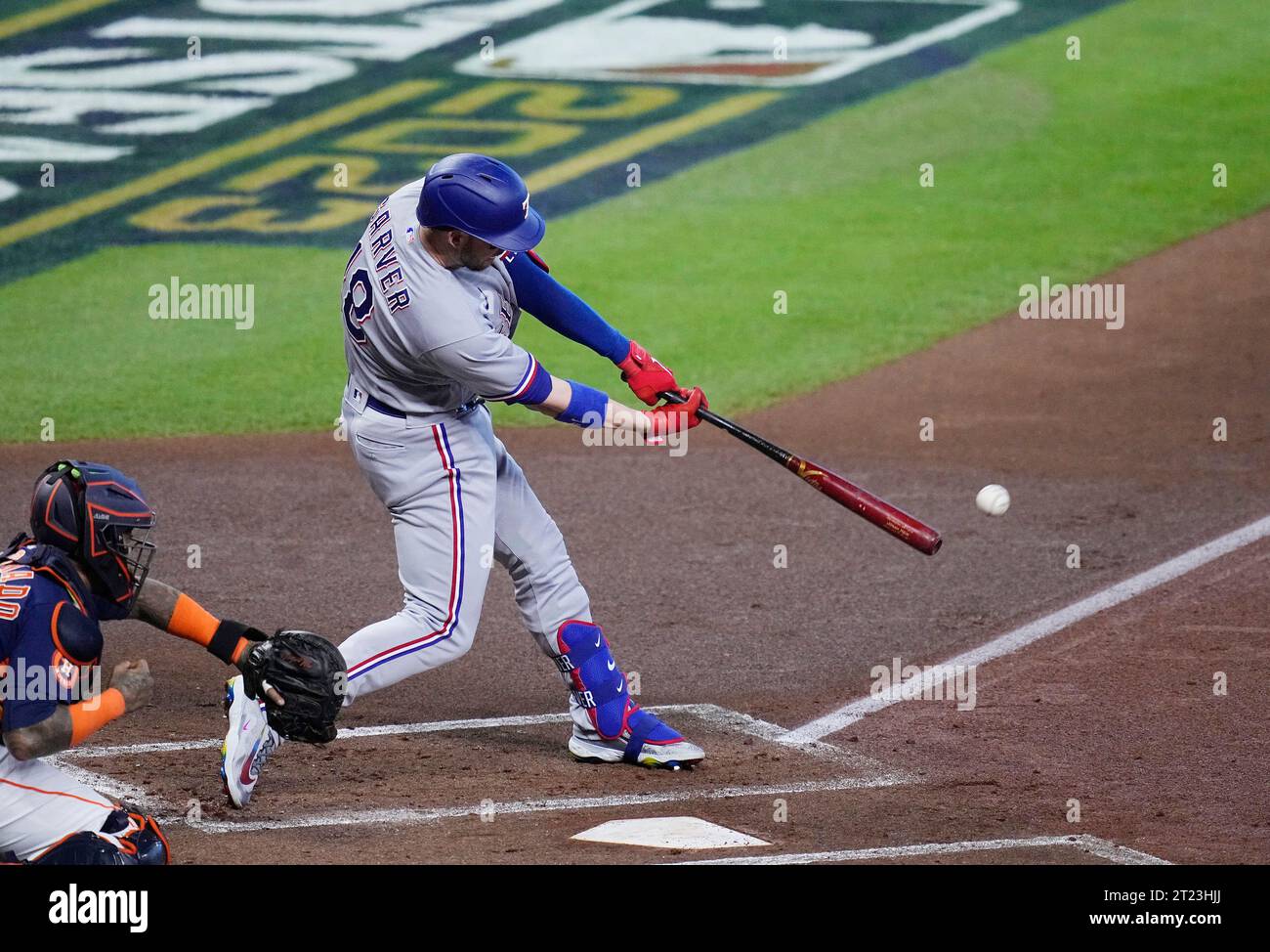 Houston, United States. 16th Oct, 2023. Texas Ranger Mitch Garver hits an rbi-single in the first inning against the Houston Astros in game two of the ALCS at Minute Maid Park in Houston on Monday, October 16, 2023. Photo by Kevin M. Cox/UPI Credit: UPI/Alamy Live News Stock Photo