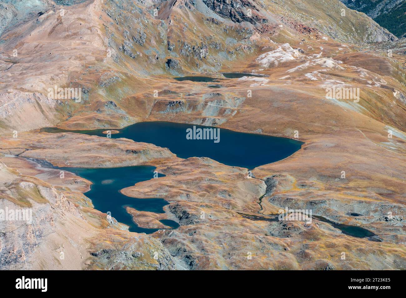 View of Leita and Rosset mountain lakes from Basei peak in autumn ...