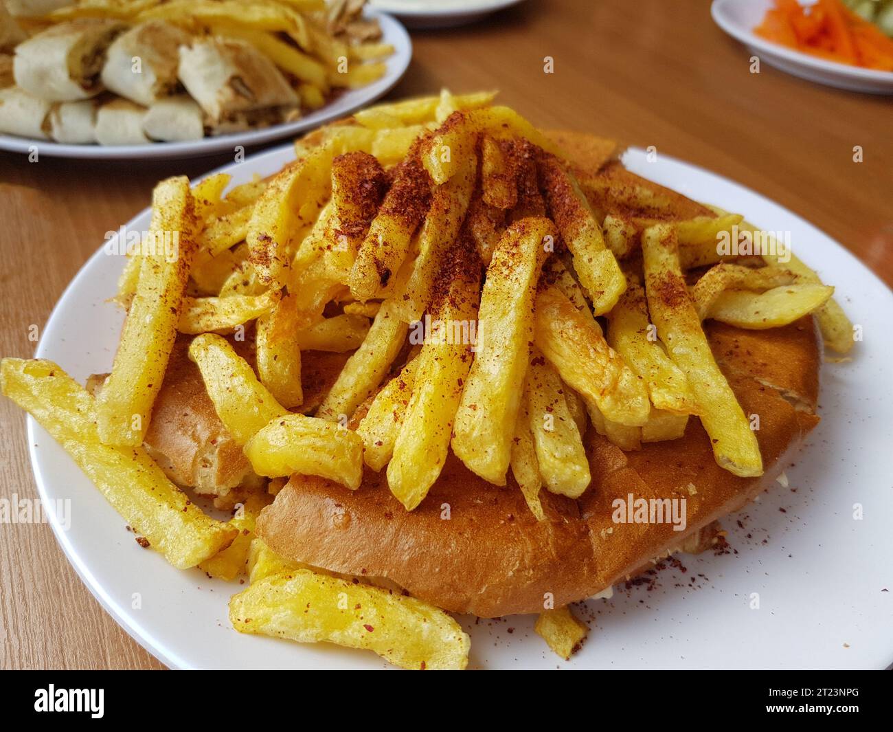 Shawarma dish served on wooden table with close up and top view also