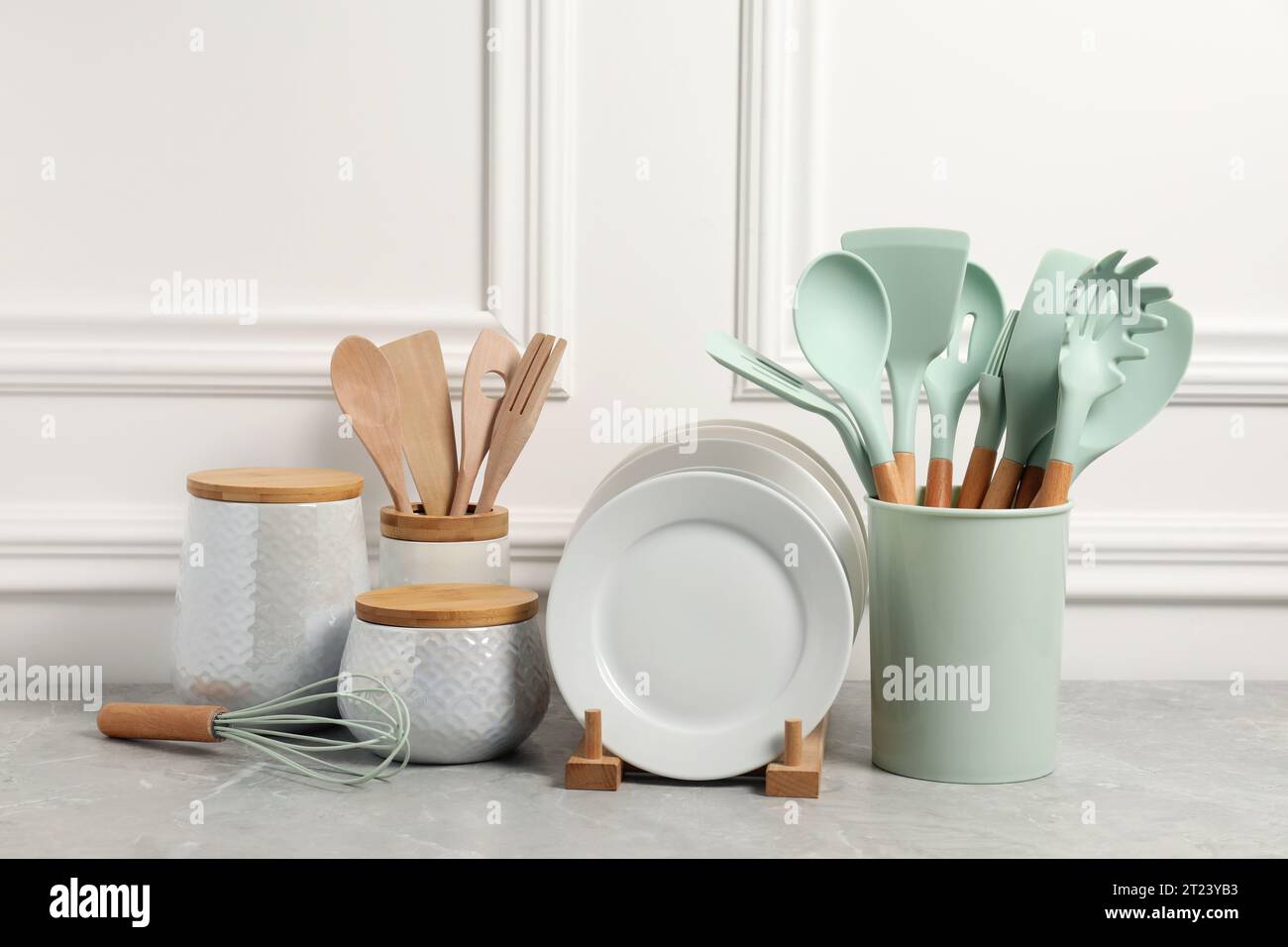 Kitchenware Different Set of different kitchenware on light gray table near white wall Stock ...