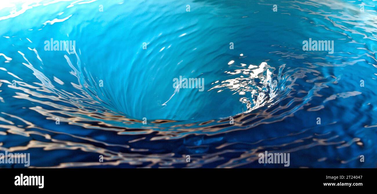 Panorama of a blue water vortex or whirlpool Stock Photo