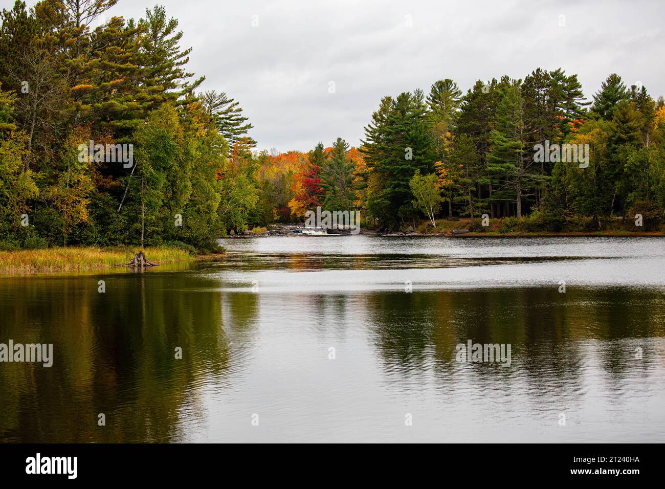 Waterfalls flowing into Lake of the Falls in Mercer, Wisconsin in