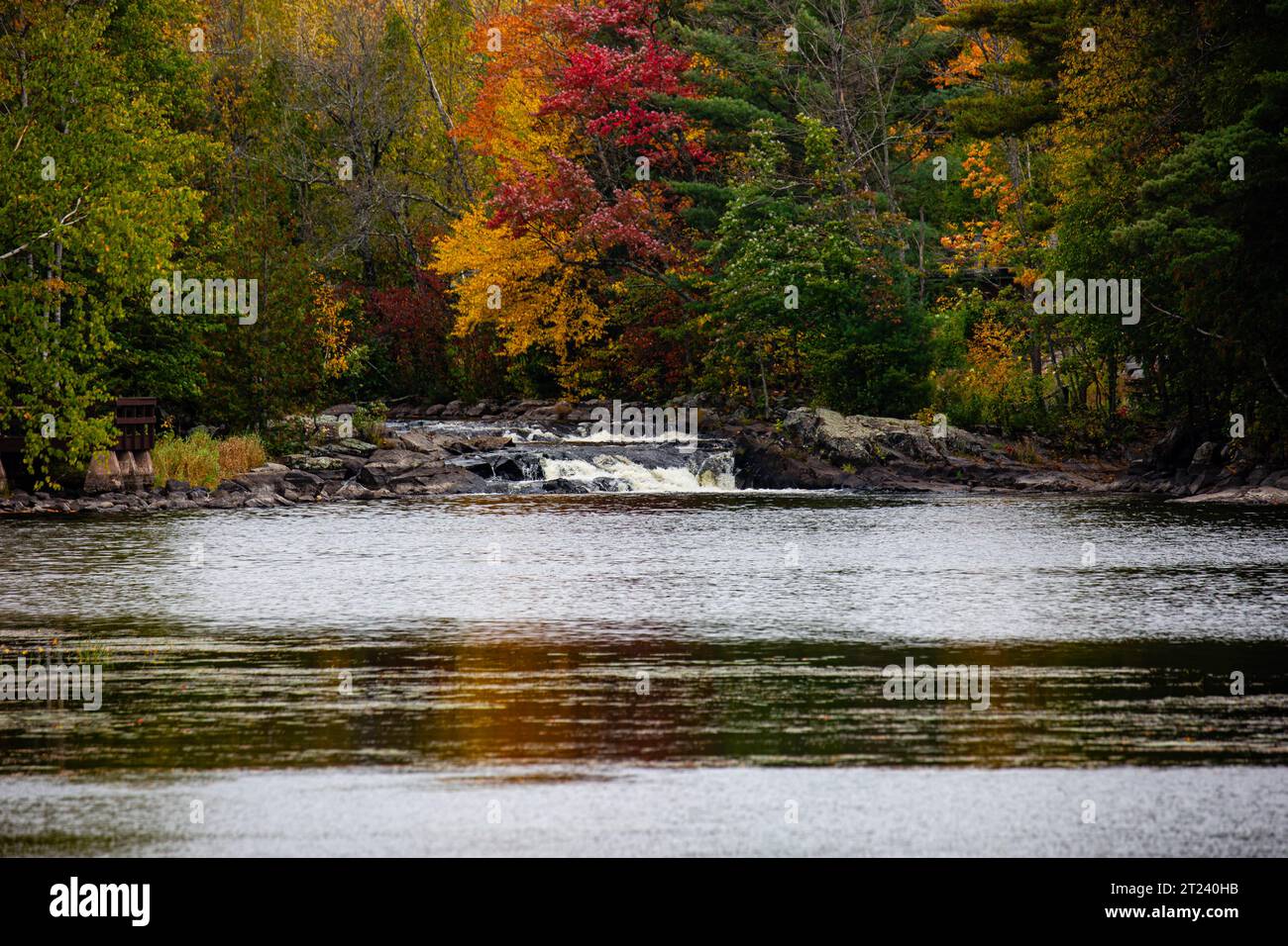 Waterfalls flowing into Lake of the Falls in Mercer, Wisconsin in