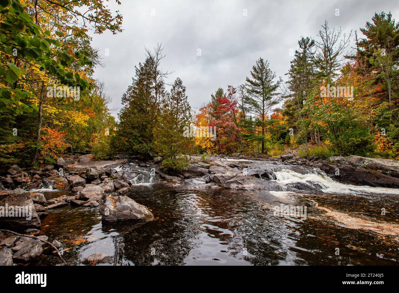 Waterfalls flowing into Lake of the Falls in Mercer, Wisconsin in