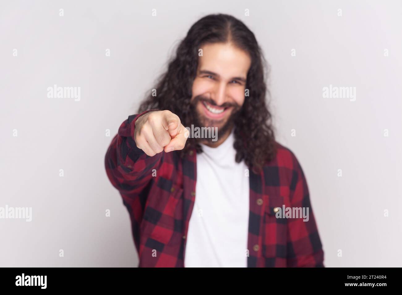 Man curly hair points finger hi-res stock photography and images - Alamy