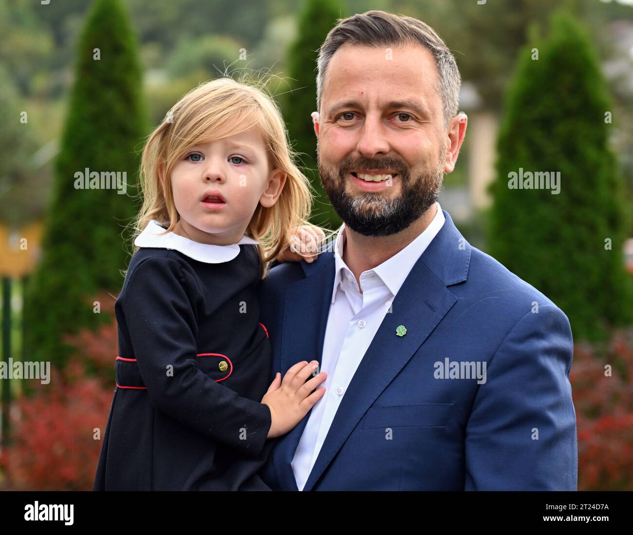 Podolany, Poland. 15th Oct, 2023. Wladyslaw Kosiniak-Kamysz (R), president of PSL and co-leader of Trzecia Droga poses with his daughter in front of the polling station. (Photo by Alex Bona/SOPA Images/Sipa USA) Credit: Sipa USA/Alamy Live News Stock Photo