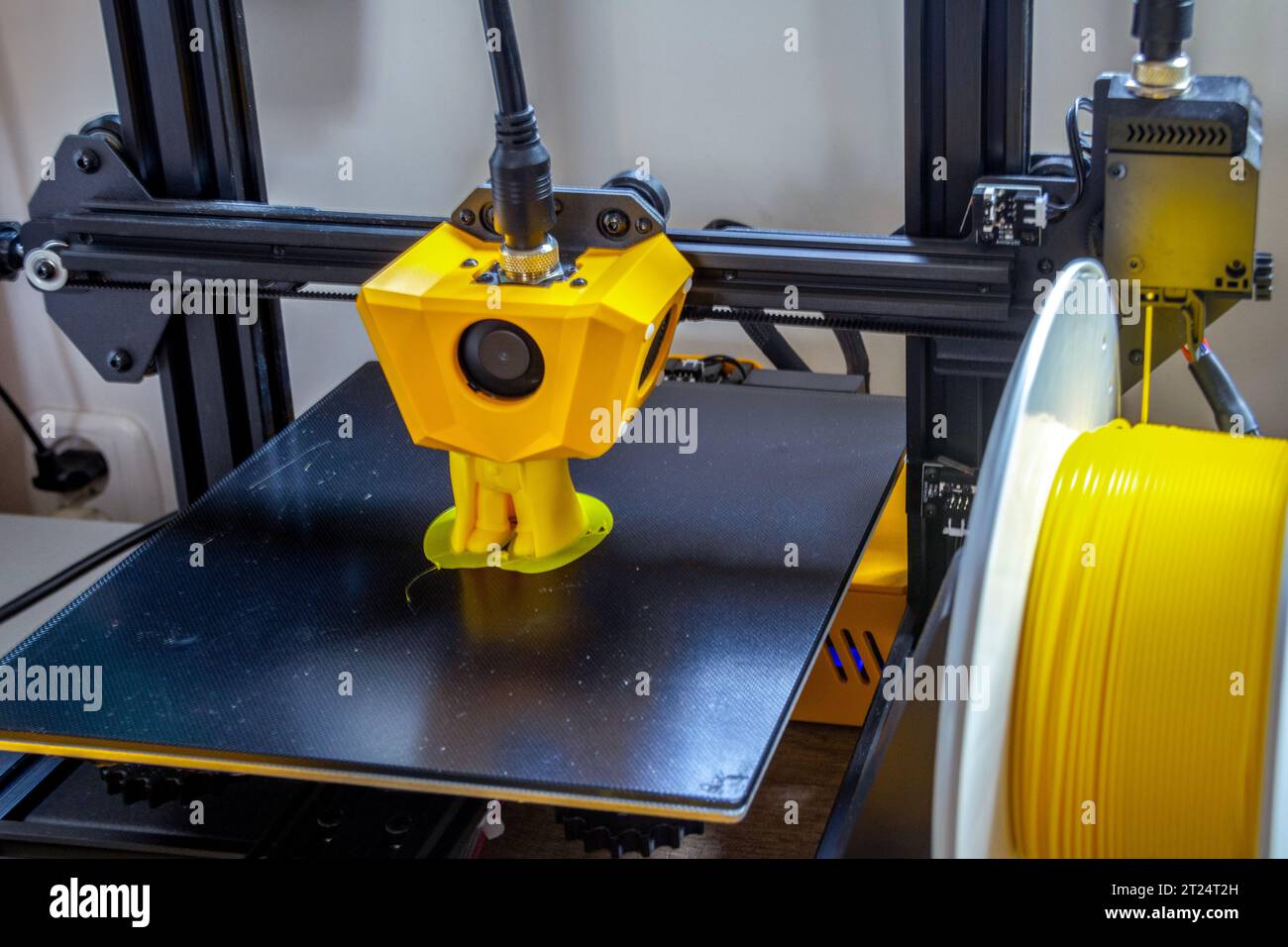 Printed on a 3D printer with yellow filament. Stock Photo