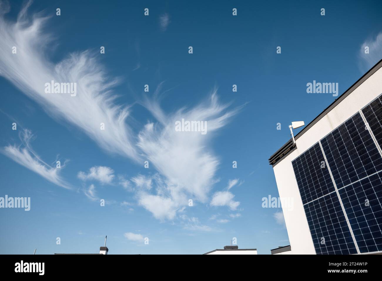Rooftop of a privat house with a solar power station Stock Photo