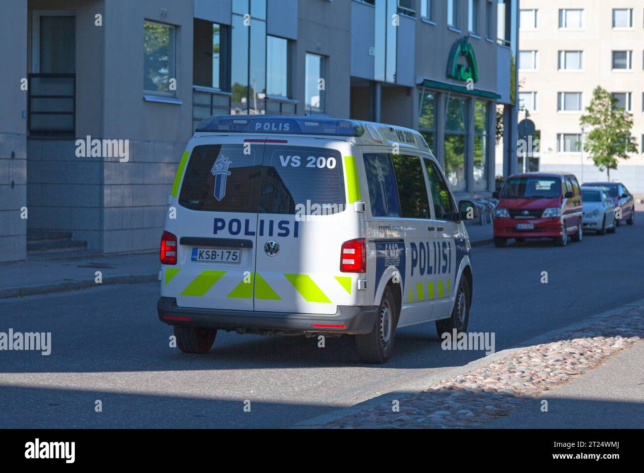 Turku, Finland - June 16 2019: A police van patrolling the street alongside the river. Stock Photo